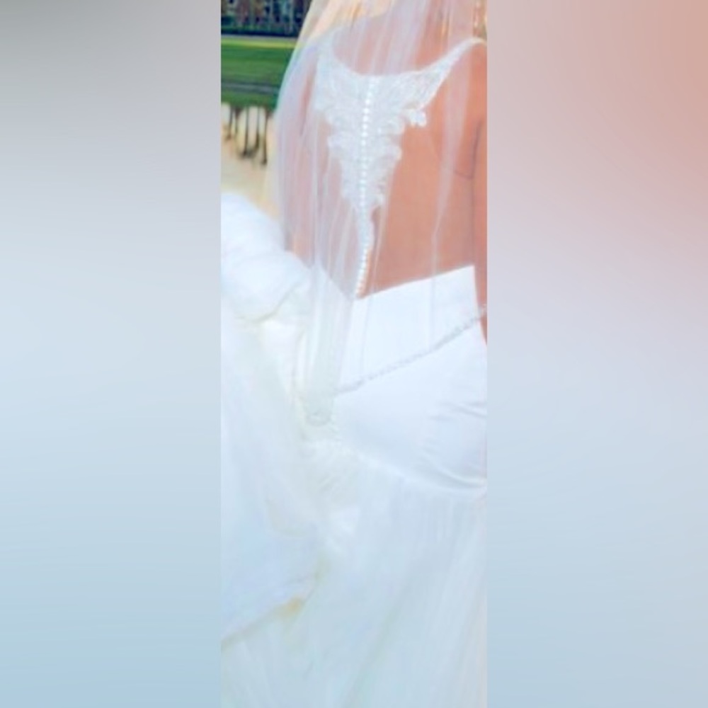 White Wedding Dress for bride. Size 10 Essence of Australia